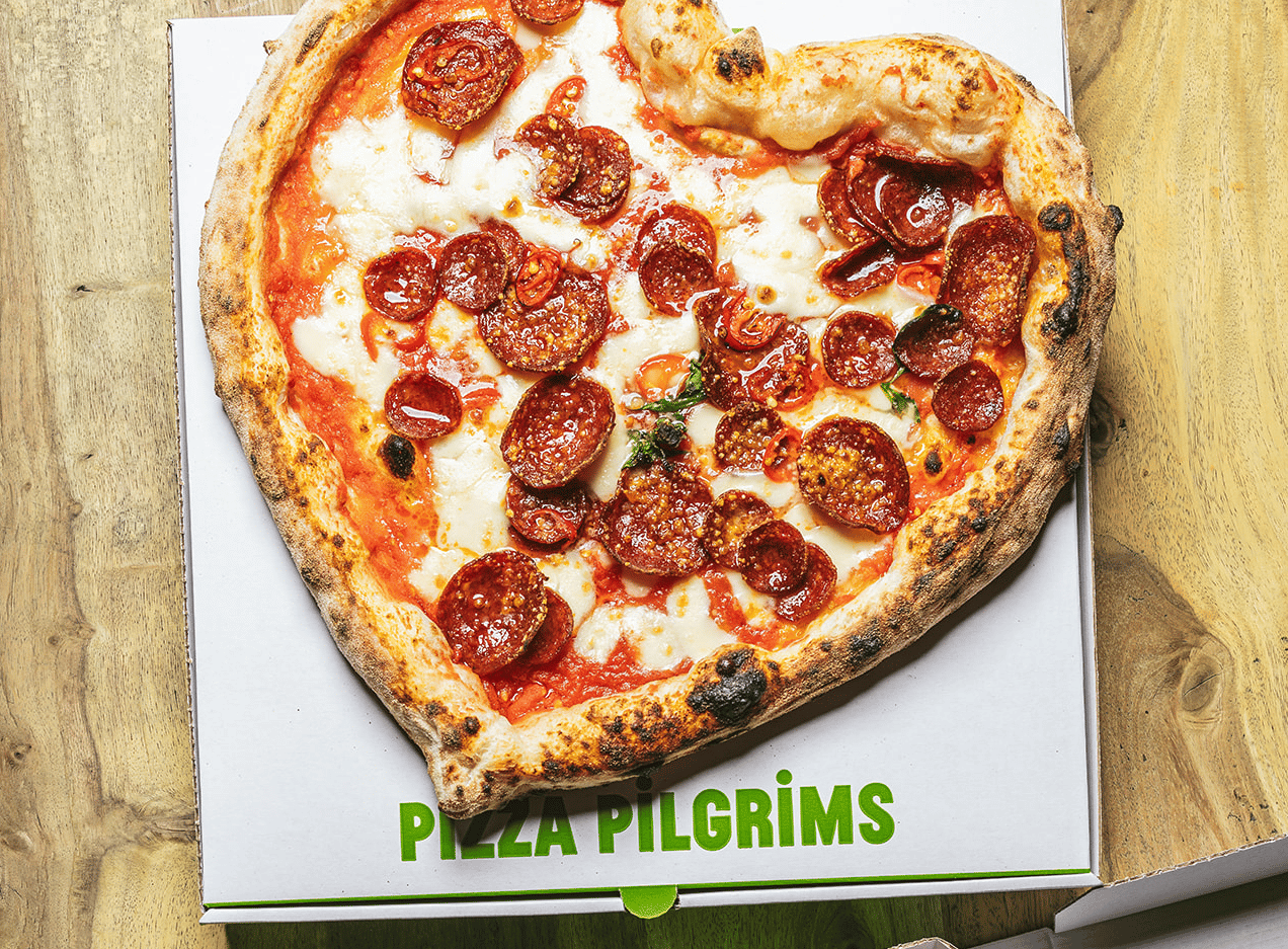 A heart-shaped pepperoni and spicy honey pizza from Pizza Pilgrims.