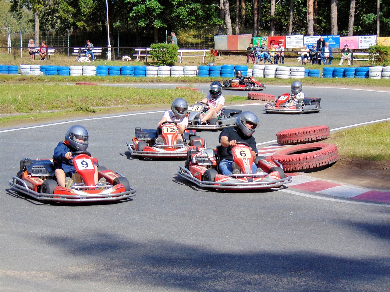 group of people go karting outside